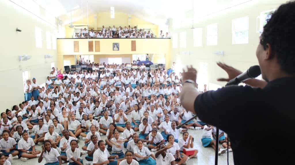 Students of St. Joseph Convent, St. Joseph react to spoken word performance by Jean-Claude Cournand