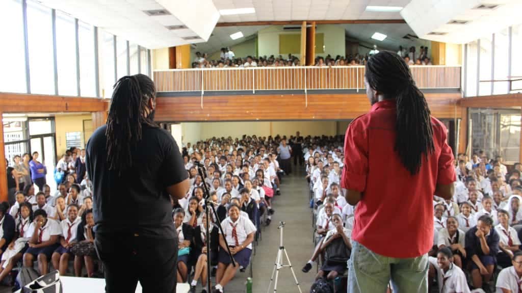 Poets Amilcar Sanatan and Idrees Kalinegro Saleem perform for Bishops Anstey High School in Port of Spain