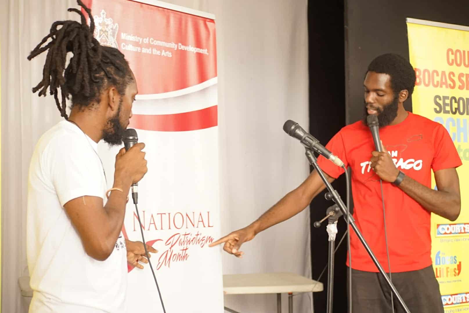 Hosts and poets, Idrees Saleem and Derron Sandy (left to right), highlight "National Patriotism Month", the reason for the tour's partnership with the CDCA Ministry. 
