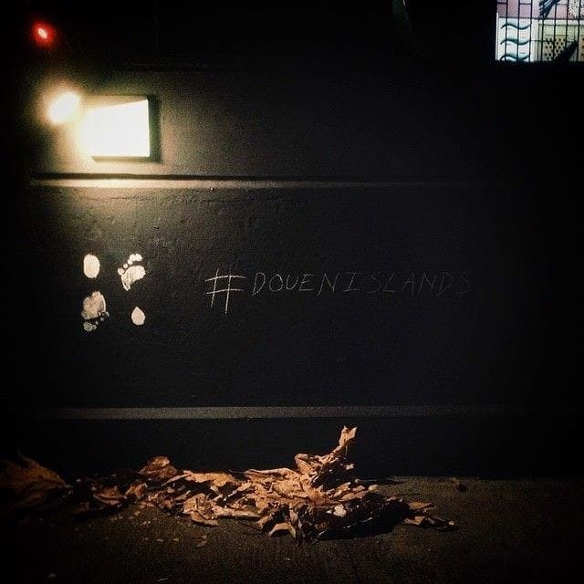 Douen Islands hashtag and logo, at the Alice Yard entrance.