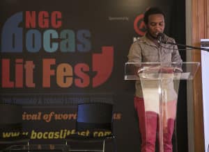 Vladimir Lucien reads from Sounding Ground at the book's official launch, during the 2014 NGC Bocas Lit Fest. Photo © Marlon James.