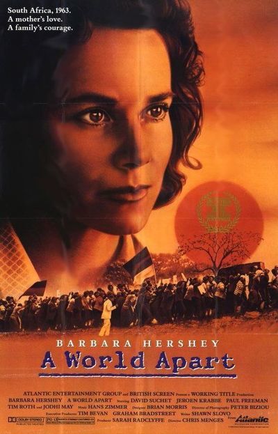A World Apart film poster featuring a close-up of Barbara Hershey above a silhouette of a crowd protesting under a large orange sun, capturing an adventure in a world apart.